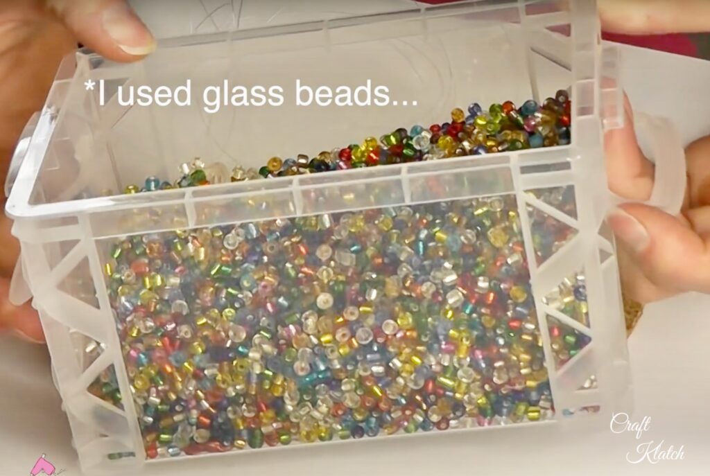 Container of colorful glass beads