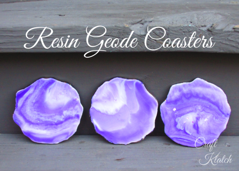 Three purple and white resin geode coasters