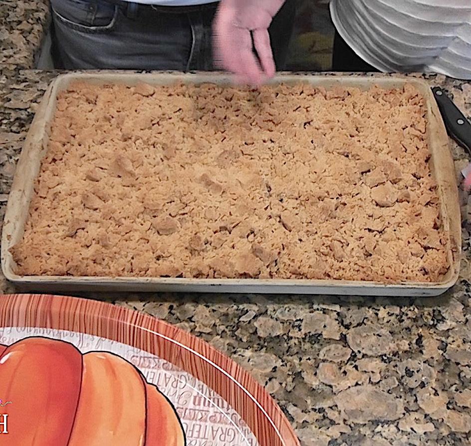 Finish sprinkling streusel crumb topping over apple bars