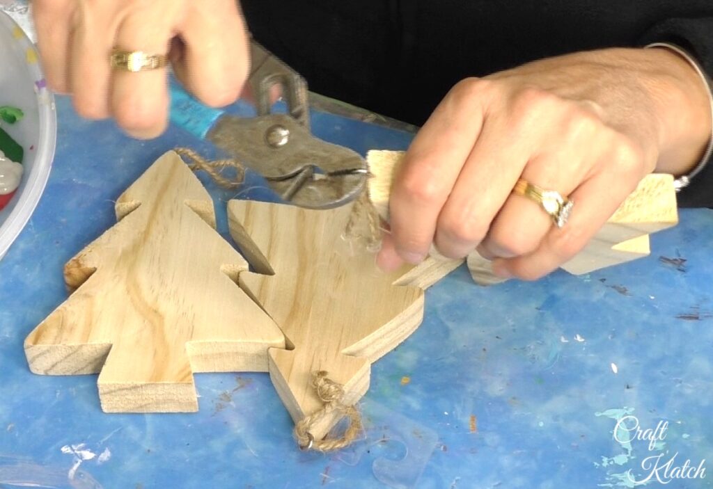 Remove eye screw from unfinished wood Christmas trees