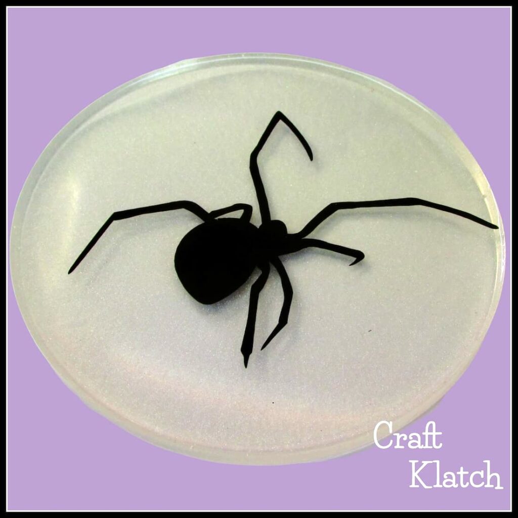 Spider silhouette coaster