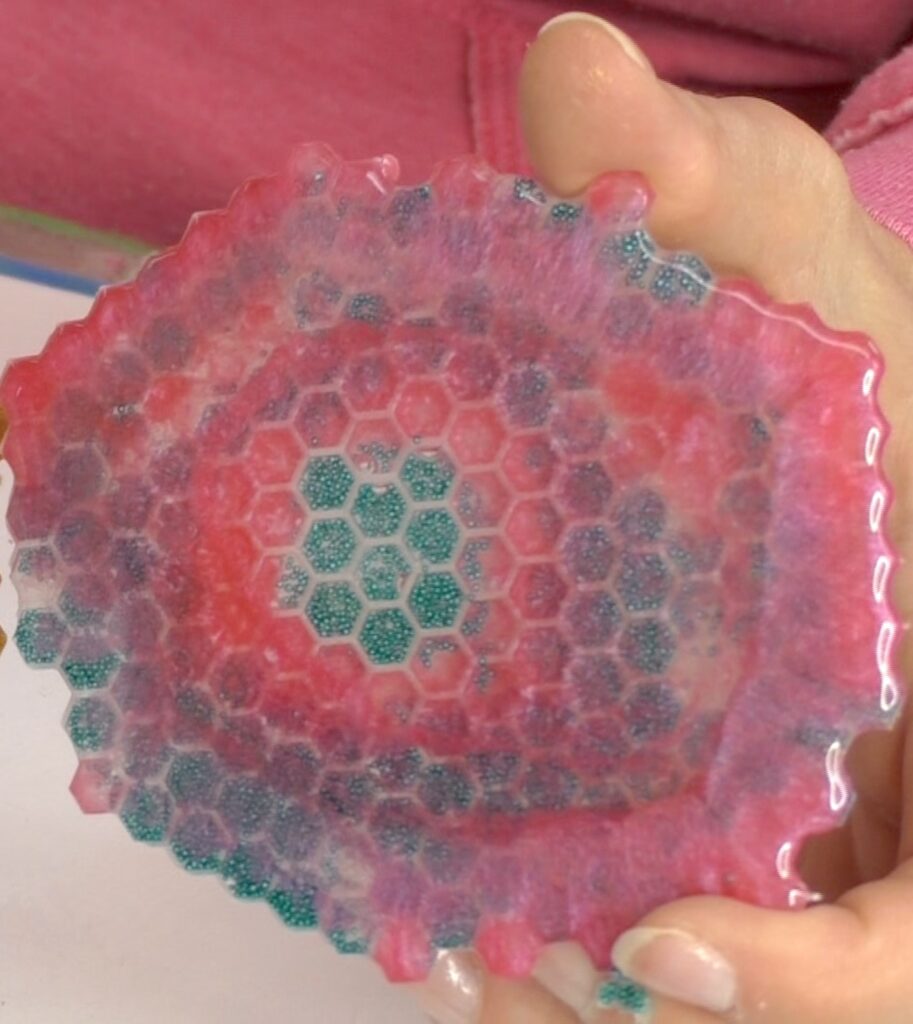 Pink pigment and blue microbead free form resin coaster