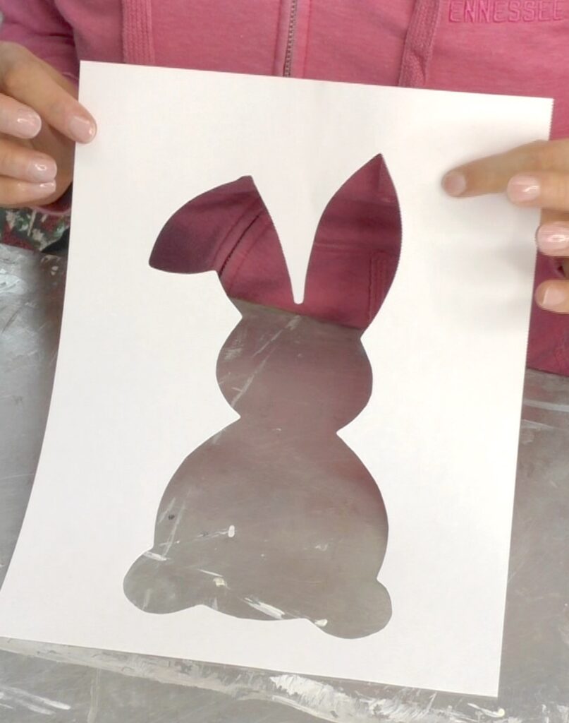 Easter bunny shape cut out of paper for the art