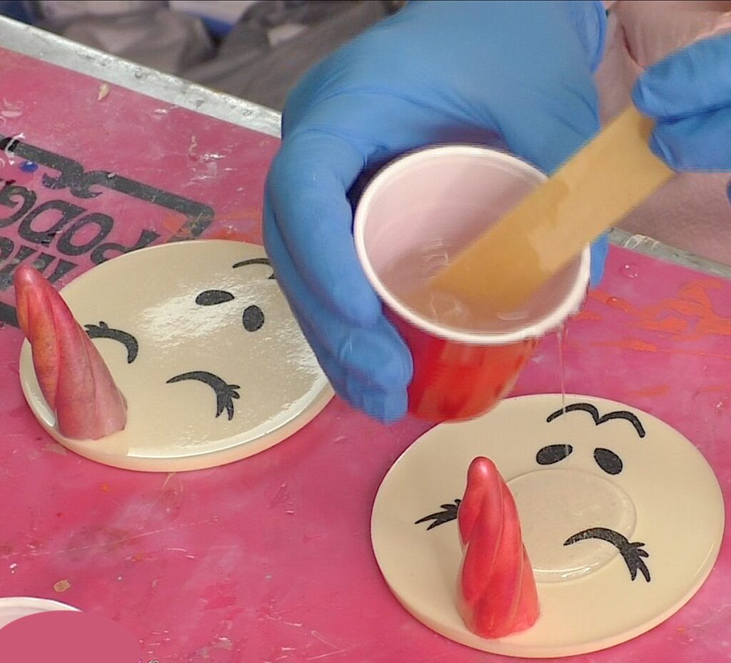 pour resin onto faces unicorn decor