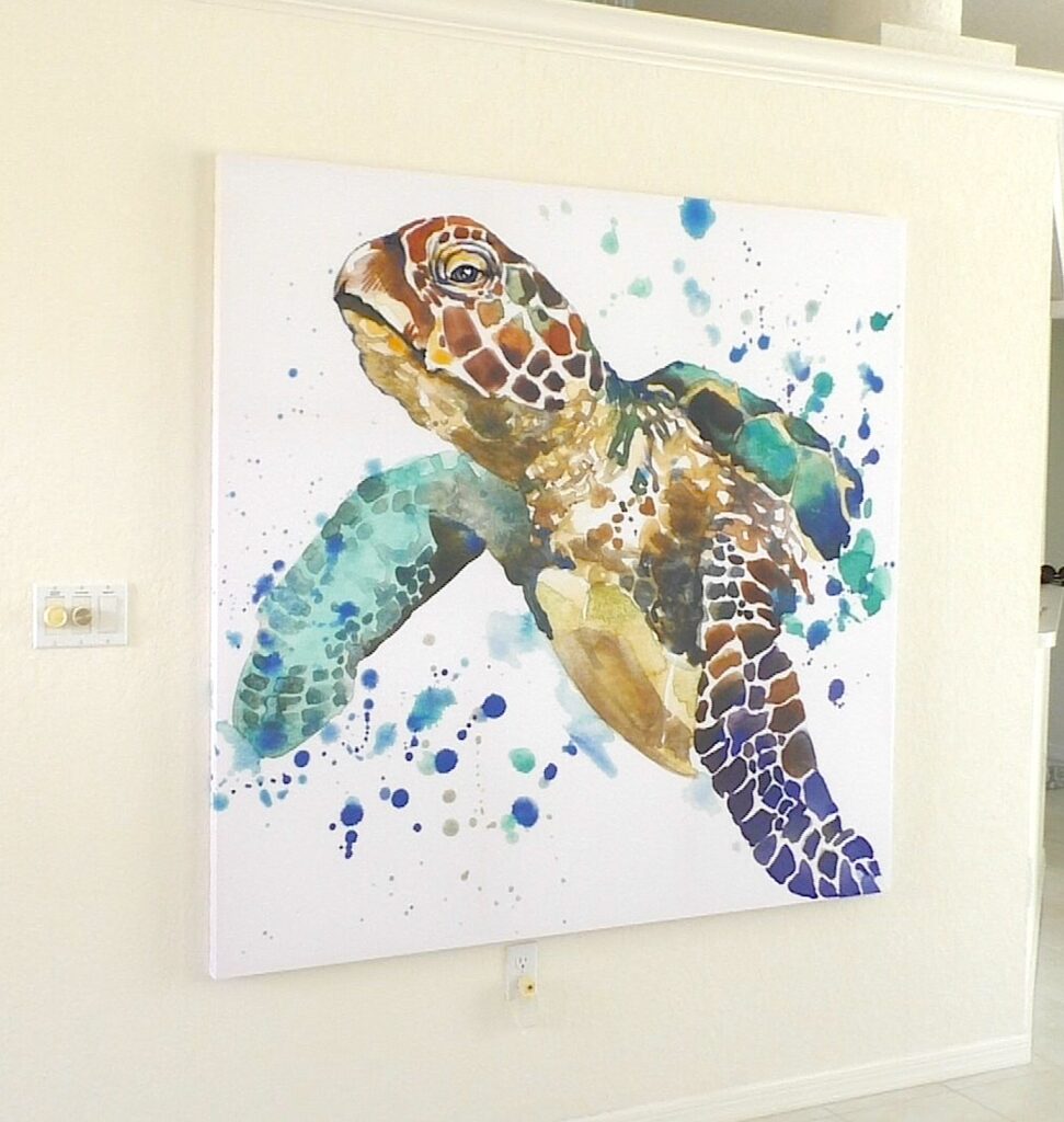 Sea turtle large wall art hanging on a wall