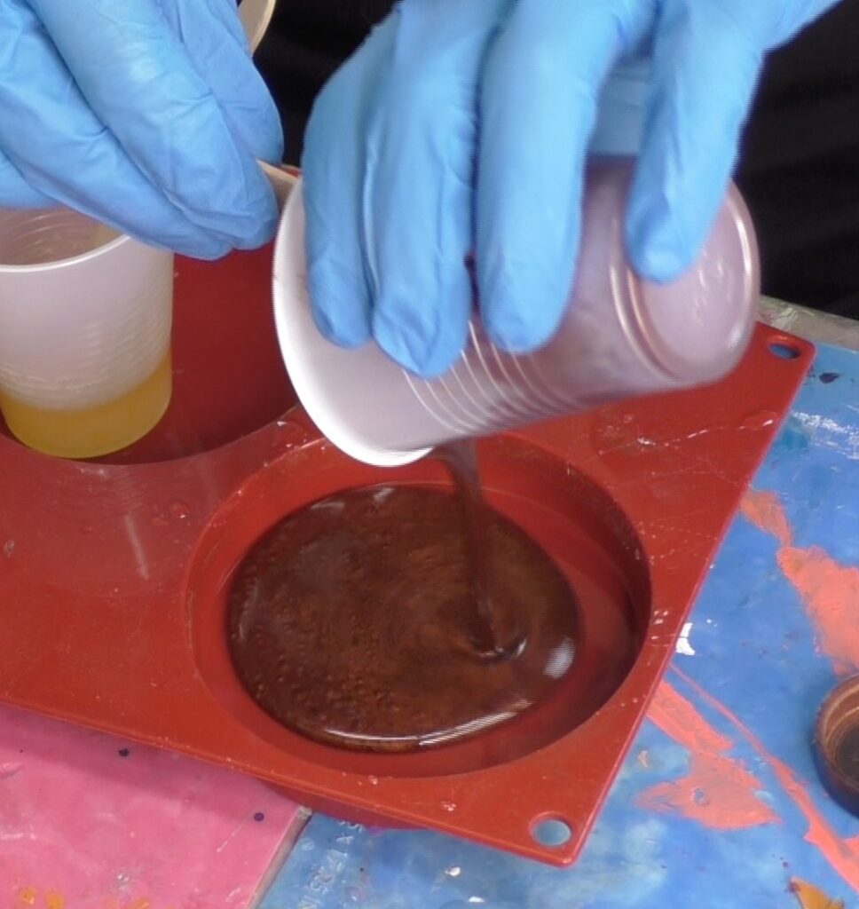 Pour colored resin into the coaster mold