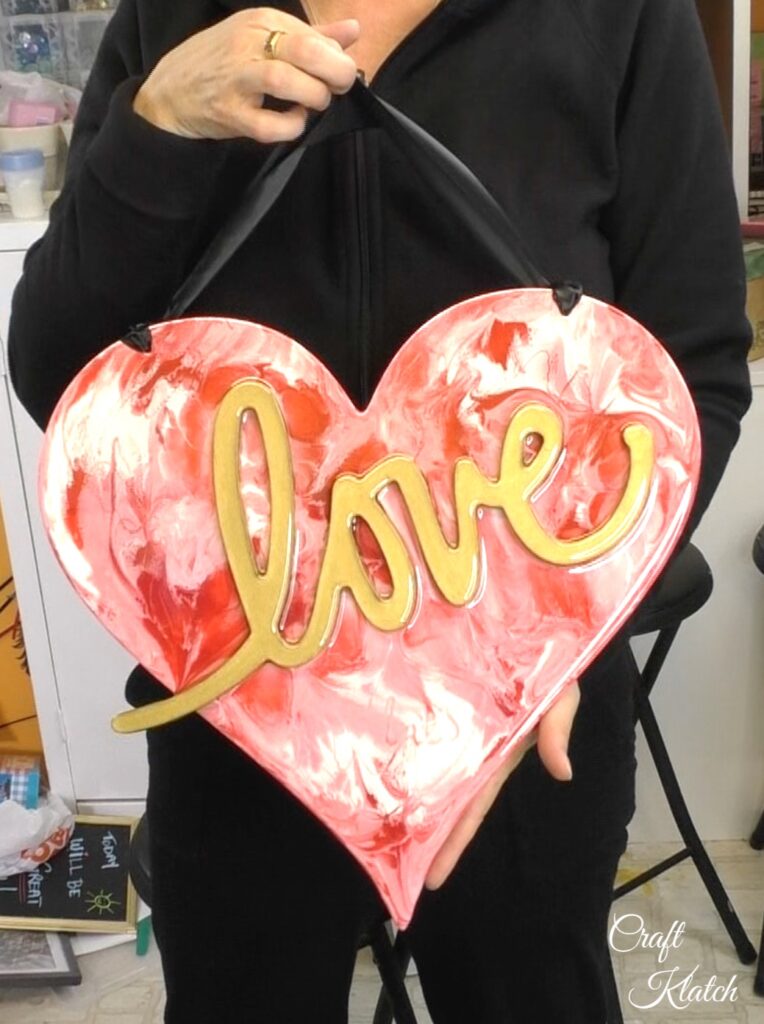 Holding finished Valentine's Day Heart Art