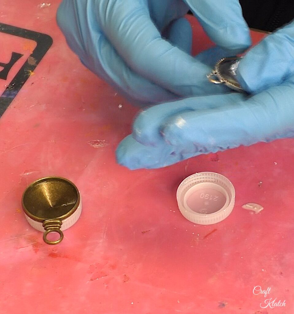 Bronze bezel placed on bottle cap