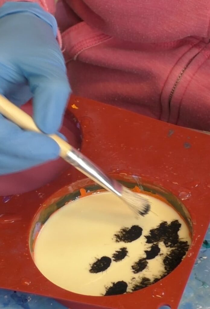 Painting the white fast curing resin for the resin coaster