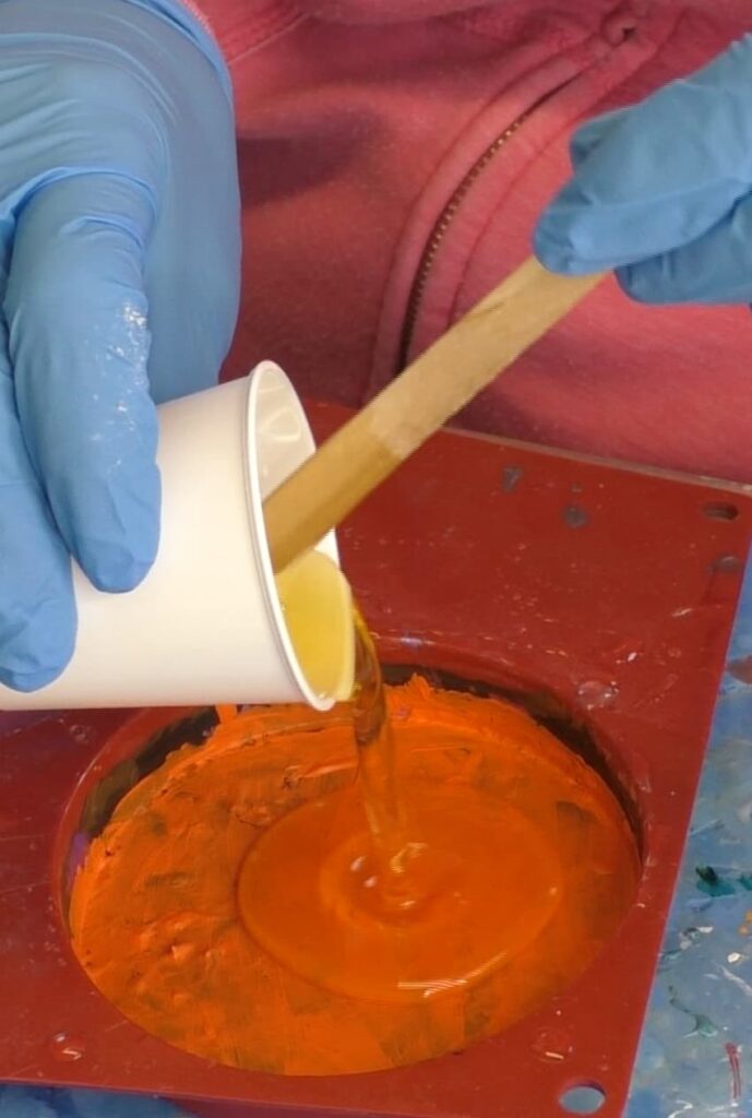Pouring fast curing resin for coaster