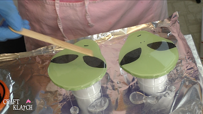 Learn how to make Alien Resin Coasters! It's an easy resin craft idea perfect for Halloween decor! #craftklatch #alien #aliencrafts #resin #resincrafts #resindiys #resincoasters #diy #ufo #howto #halloween #halloweencrafts
