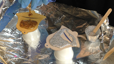 Learn how to make Christmas Bell Resin coasters! It's great home decor idea for decorating for the holidays and because the wood cutouts are from Dollar Tree, they are great for decorating on a budget! #craftklatch #craftideas #christmas #christmascraftideas #christmascrafts #diy #howto #crafts #crafting #glittercrafts #resin #resincrafts #resindiys #resinart #resincoasters #dollartree #dollartreecrafts #decoratingonabudget