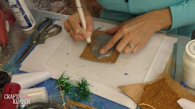 Learn how to make Christmas Bell Resin coasters! It's great home decor idea for decorating for the holidays and because the wood cutouts are from Dollar Tree, they are great for decorating on a budget! #craftklatch #craftideas #christmas #christmascraftideas #christmascrafts #diy #howto #crafts #crafting #glittercrafts #resin #resincrafts #resindiys #resinart #resincoasters #dollartree #dollartreecrafts #decoratingonabudget