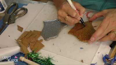 Learn how to make Christmas Bell Resin coasters! It's great home decor idea for decorating for the holidays and because the wood cutouts are from Dollar Tree, they are great for decorating on a budget! #craftklatch #craftideas #christmas #christmascraftideas #christmascrafts #diy #howto #crafts #crafting #glittercrafts #resin #resincrafts #resindiys #resinart #resincoasters #dollartree #dollartreecrafts #decoratingonabudget