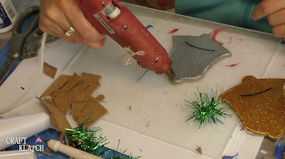Learn how to make Christmas Bell Resin coasters! It's great home decor idea for decorating for the holidays and because the wood cutouts are from Dollar Tree, they are great for decorating on a budget! #craftklatch #craftideas #christmas #christmascraftideas #christmascrafts #diy #howto #crafts #crafting #glittercrafts #resin #resincrafts #resindiys #resinart #resincoasters #dollartree #dollartreecrafts #decoratingonabudget