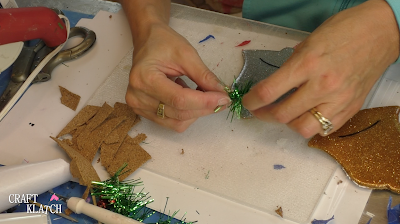Learn how to make Christmas Bell Resin coasters! It's great home decor idea for decorating for the holidays and because the wood cutouts are from Dollar Tree, they are great for decorating on a budget! #craftklatch #craftideas #christmas #christmascraftideas #christmascrafts #diy #howto #crafts #crafting #glittercrafts #resin #resincrafts #resindiys #resinart #resincoasters #dollartree #dollartreecrafts #decoratingonabudget