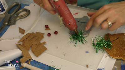 Learn how to make Christmas Bell Resin coasters! It's great home decor idea for decorating for the holidays and because the wood cutouts are from Dollar Tree, they are great for decorating on a budget! #craftklatch #craftideas #christmas #christmascraftideas #christmascrafts #diy #howto #crafts #crafting #glittercrafts #resin #resincrafts #resindiys #resinart #resincoasters #dollartree #dollartreecrafts #decoratingonabudget