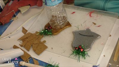 Learn how to make Christmas Bell Resin coasters! It's great home decor idea for decorating for the holidays and because the wood cutouts are from Dollar Tree, they are great for decorating on a budget! #craftklatch #craftideas #christmas #christmascraftideas #christmascrafts #diy #howto #crafts #crafting #glittercrafts #resin #resincrafts #resindiys #resinart #resincoasters #dollartree #dollartreecrafts #decoratingonabudget