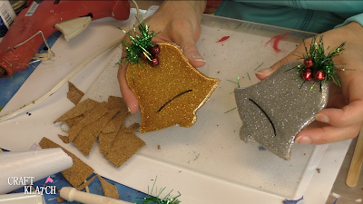 Learn how to make Christmas Bell Resin coasters! It's great home decor idea for decorating for the holidays and because the wood cutouts are from Dollar Tree, they are great for decorating on a budget! #craftklatch #craftideas #christmas #christmascraftideas #christmascrafts #diy #howto #crafts #crafting #glittercrafts #resin #resincrafts #resindiys #resinart #resincoasters #dollartree #dollartreecrafts #decoratingonabudget