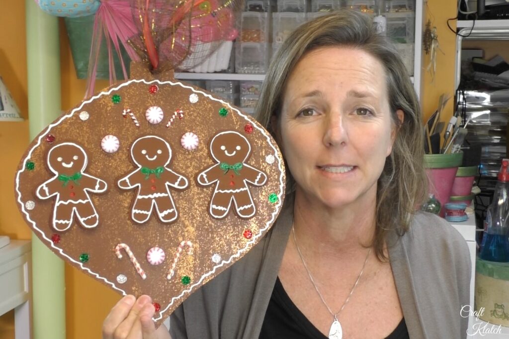 Mona holding gingerbread Christmas ornament diy