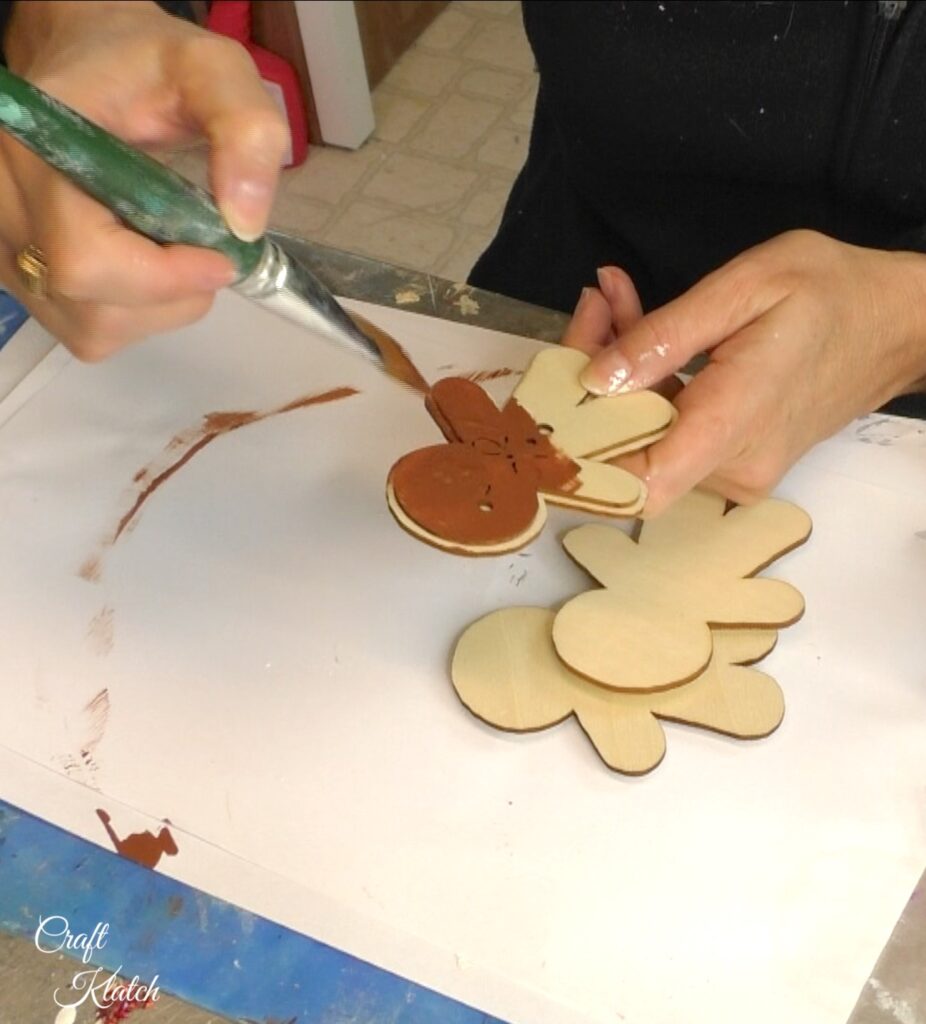 Painting gingerbread men ornaments brown