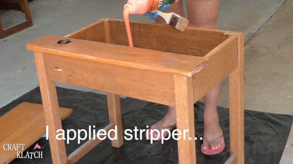 Pouring Citristrip stripper into desk