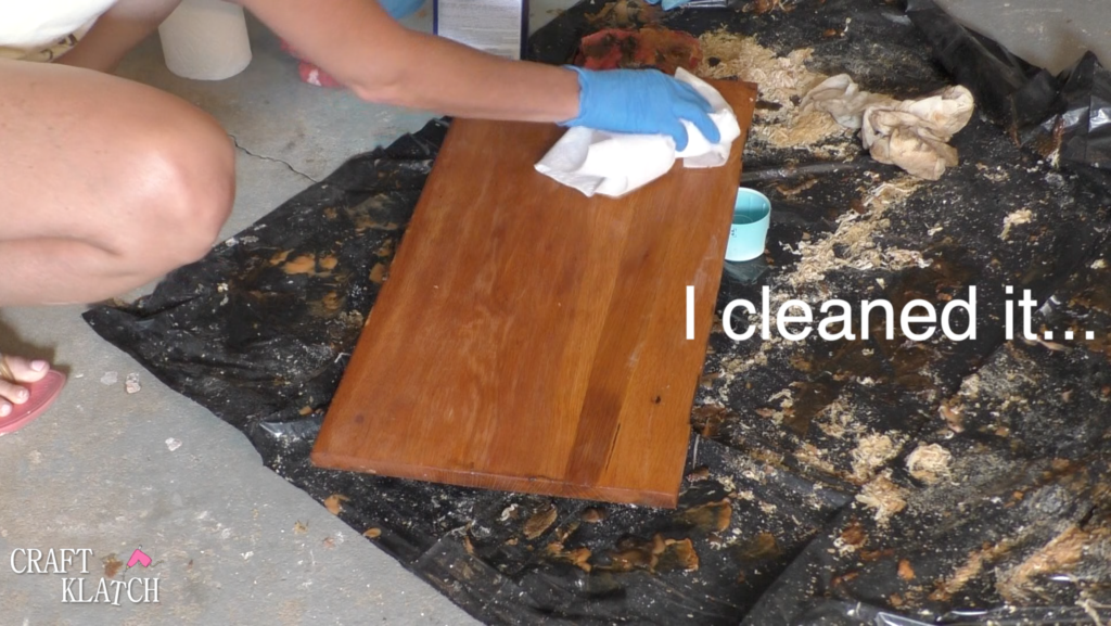 Cleaning desk with acetone after stripping off