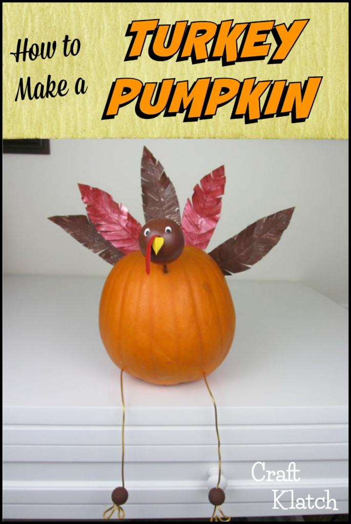 Turkey pumpkin with brown and red metal feathers and long legs craft