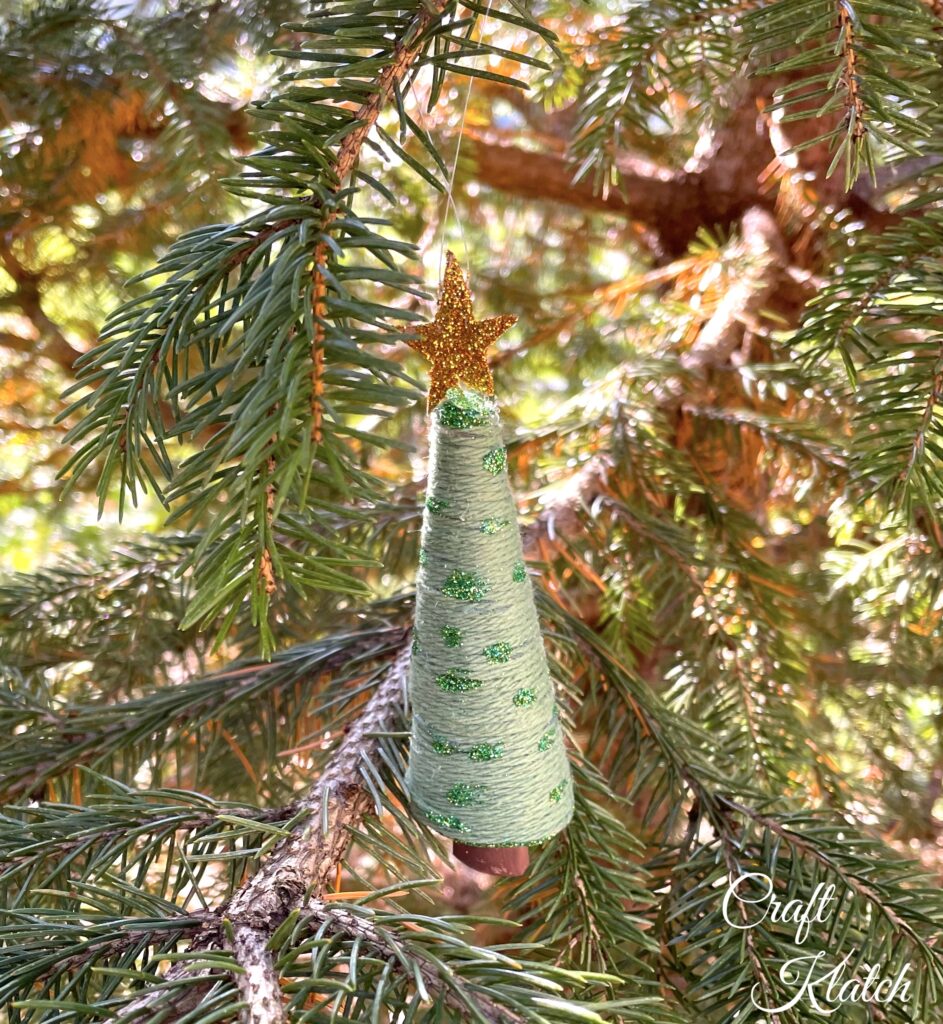 Christmas tree ornament hanging in tree