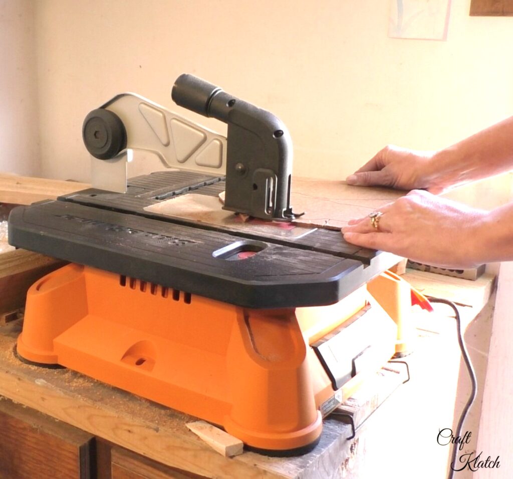 Cut out Christmas lights with saw