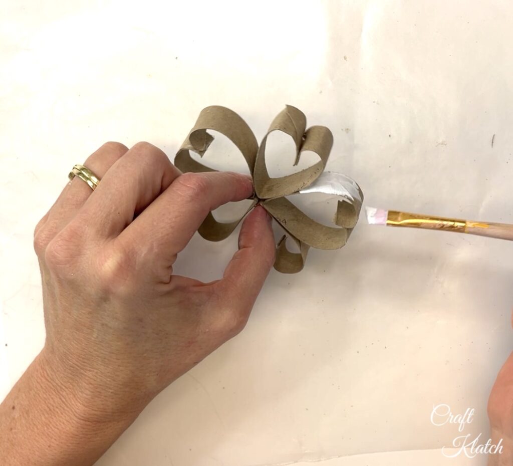 Paint the paper snowflake white