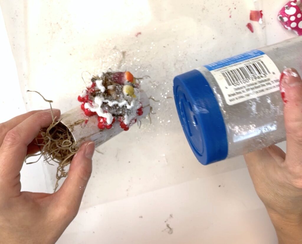 Sprinkle glitter onto wet paint for a frosty effect