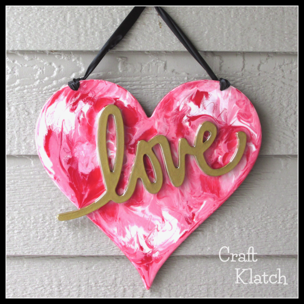 DIY Valentine's Day Resin heart art with black ribbon