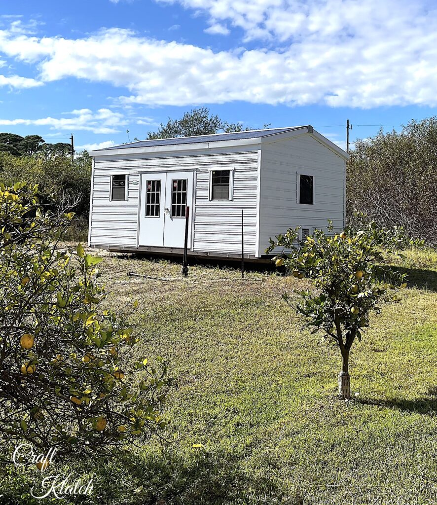 White she shed placed on lot