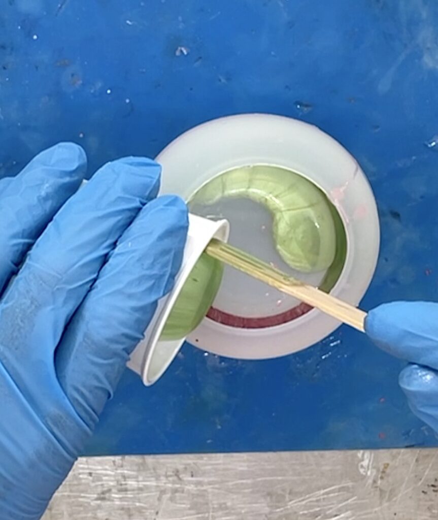 Pour green into the silicone jar mold