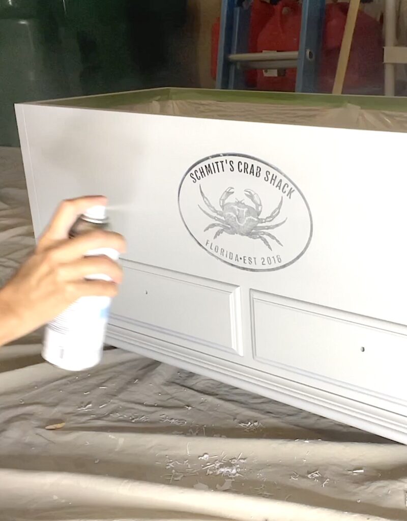 Spraying clear coat over the image transfer