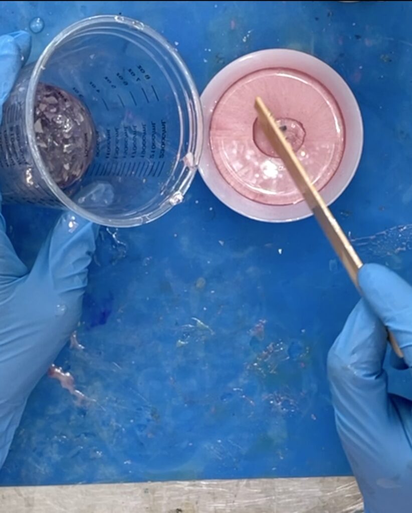 Adding a dab of resin to the lid of the tooth fairy jar idea