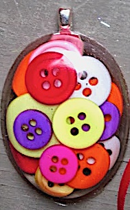 Button resin charm