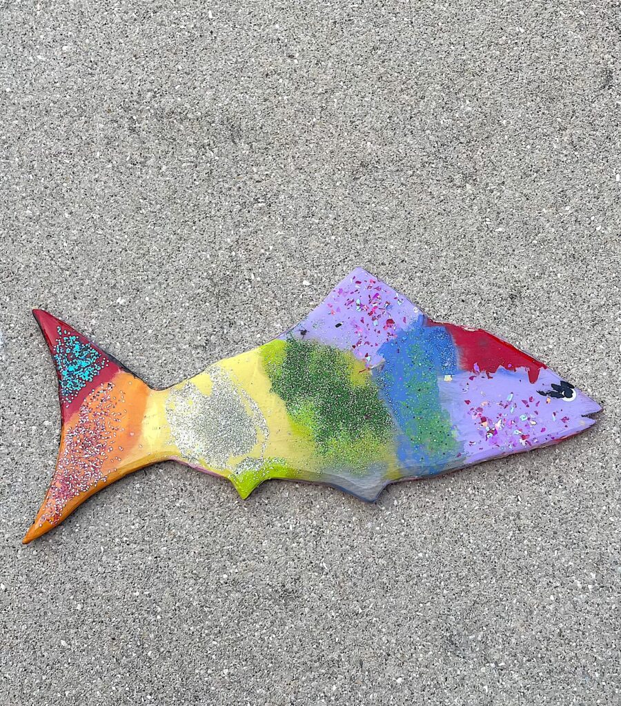 Rainbow colored wood painted fish