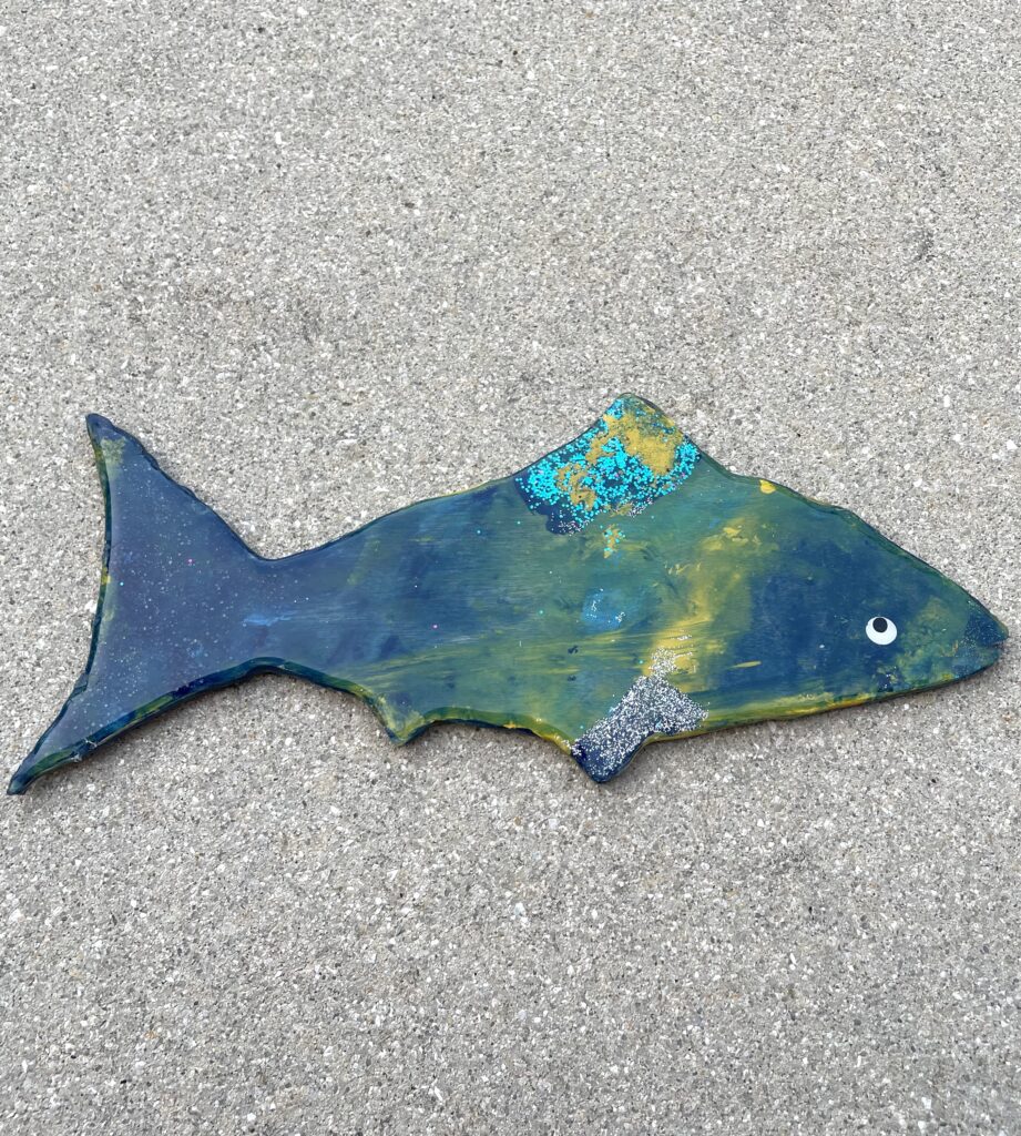 Blue and yellow wood fish