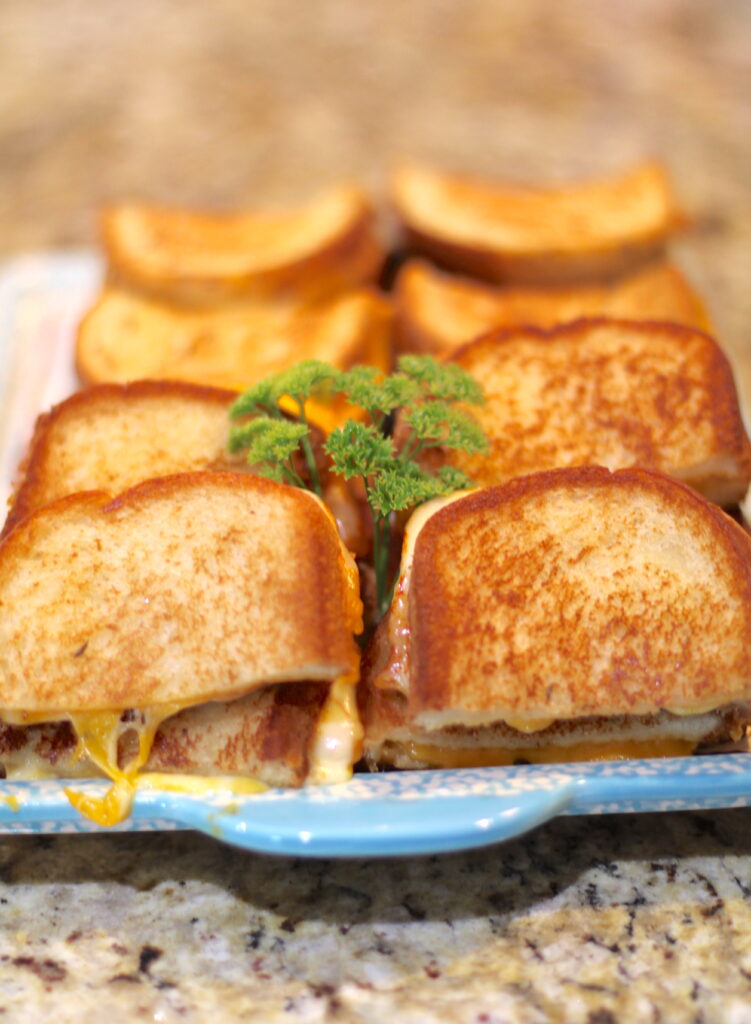 Grilled cheese sandwiches arranged on a platter