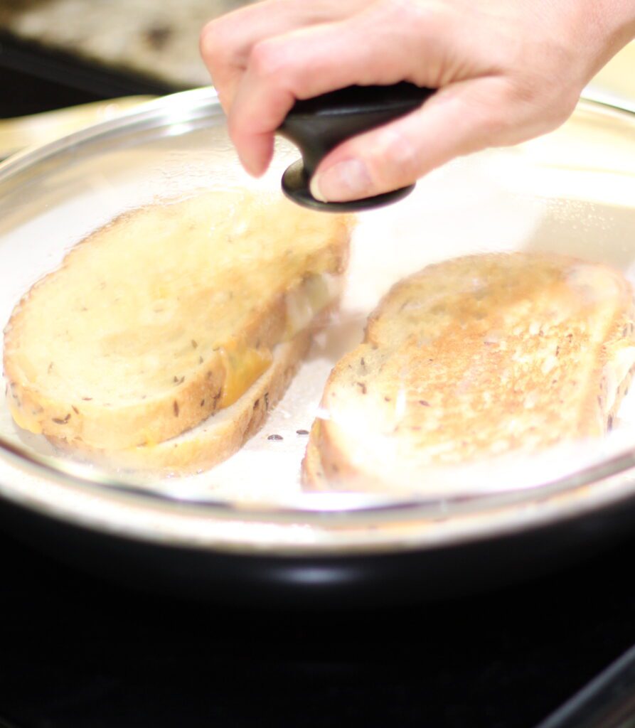 Put a lid on the cheese sandwich grilled to keep in the heat