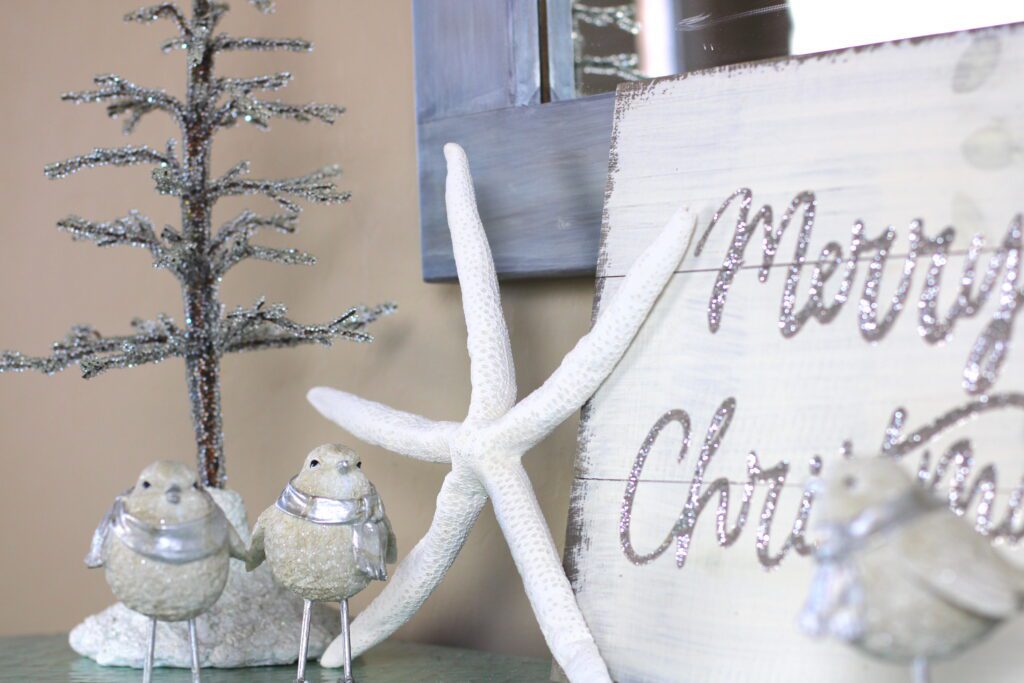 Foyer Christmas decorations with birds, starfish and Merry Christmas sign
