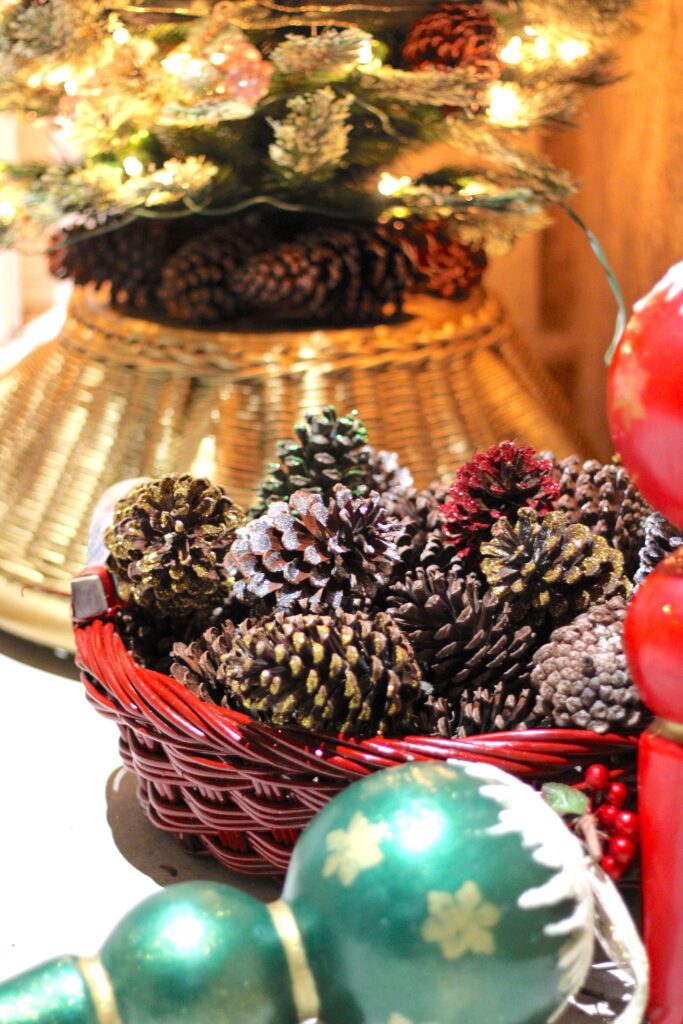 Glittered pine cone basket