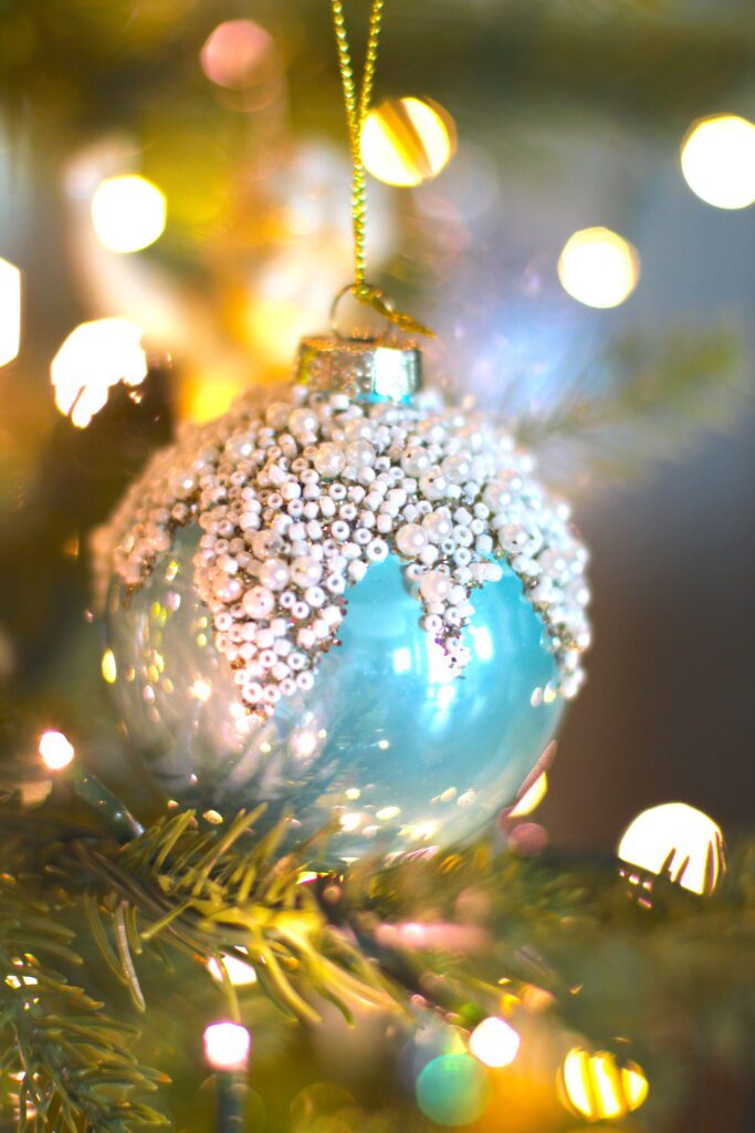 Aqua Christmas tree ornament with white beads as snow