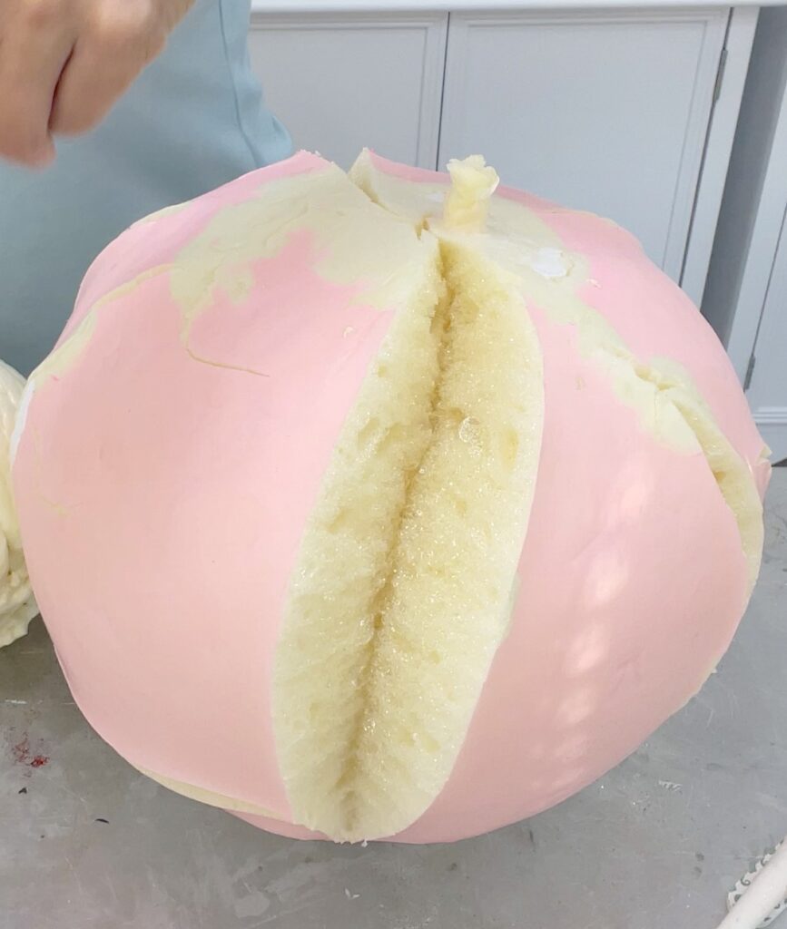 Large foam ball split to look like plumbers crack