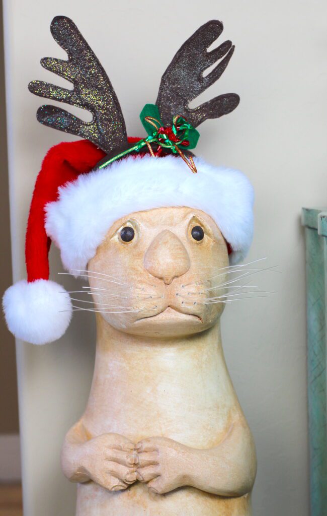 Otter decorated for Christmas