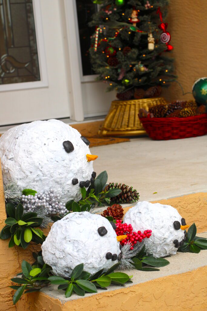 Outdoor Christmas Decorations DIY Snowmen on front porch steps