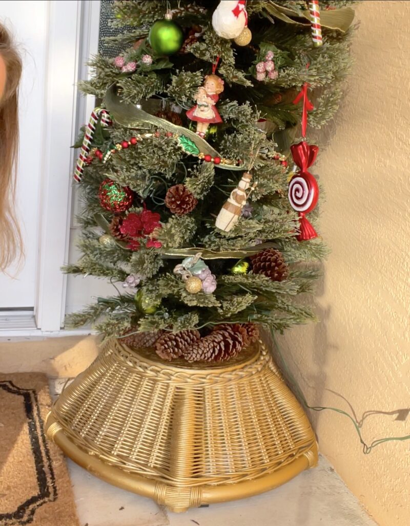 Pine cones on Christmas tree stand diy