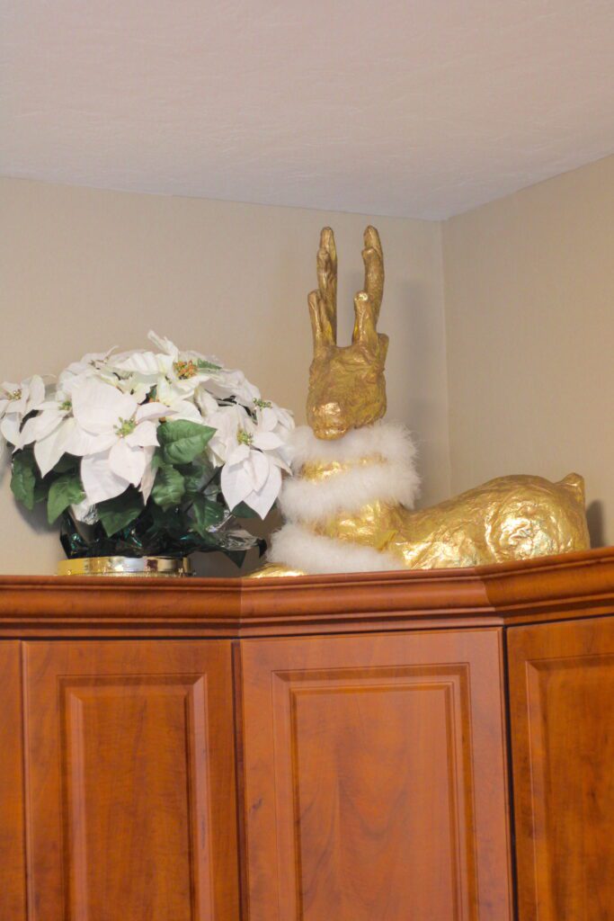 Reindeer Christmas decoration on kitchen cabinet